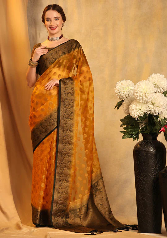 Dazzling Yellow Organza Silk Saree with Beautiful Blouse Piece